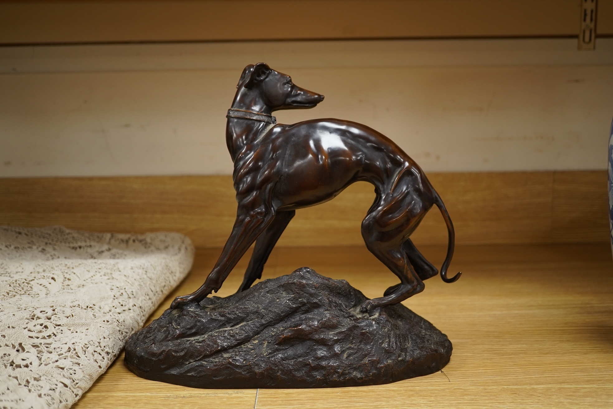 After Theodore Gechter, a model of bronze greyhound, 32cm wide x 29.5cm high